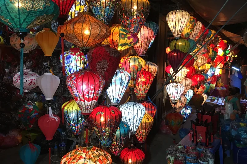 Silk lanterns hanging in a Hội An souvenir shop